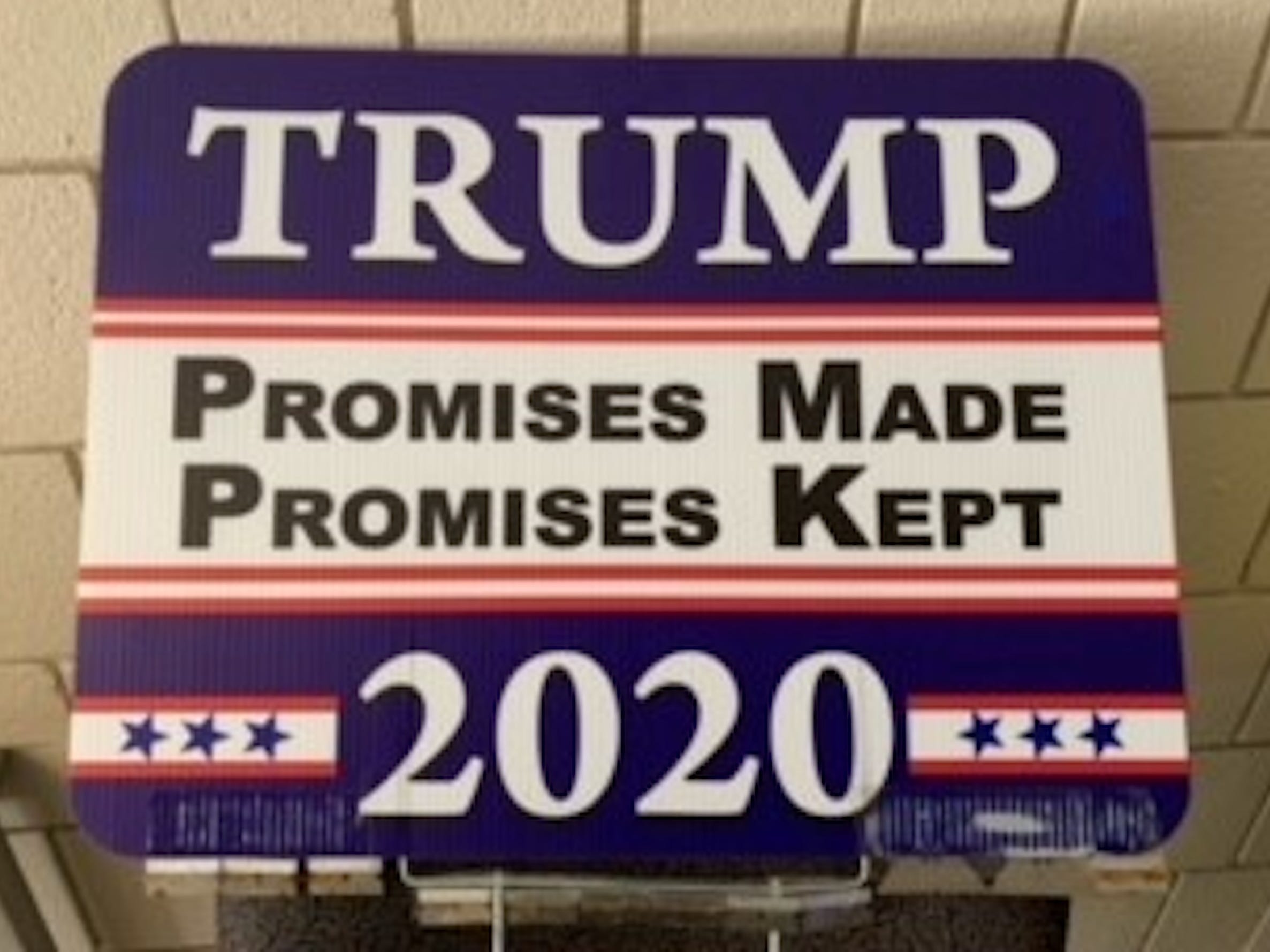 The President Donald Trump 2020 campaign lawn sign with razor blades.