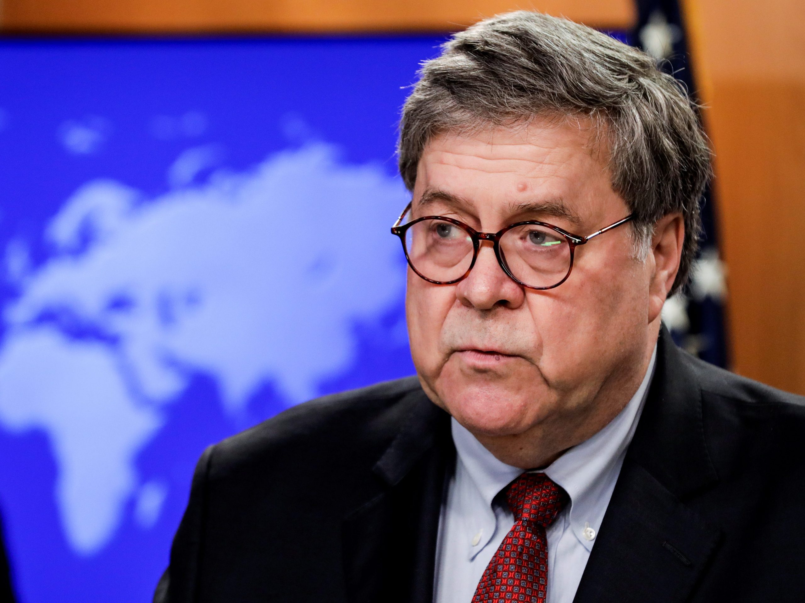 FILE PHOTO - U.S. Attorney General William Barr discusses a Trump administration executive order on the International Criminal Court during a joint news conference at the State Department in Washington, U.S., June 11, 2020. REUTERS/Yuri Gripas/Pool