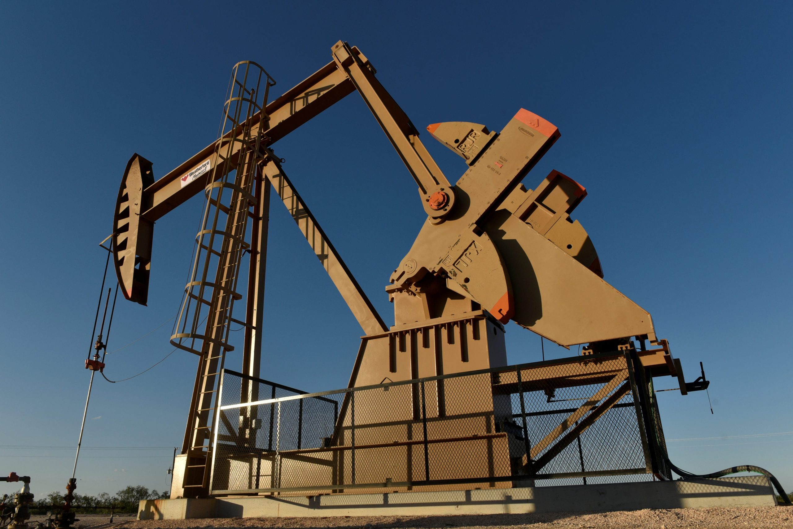FILE PHOTO: A pump jack on a lease owned by Parsley Energy operates in the Permian Basin near Midland, Texas U.S. August 23, 2018. Picture taken August 23, 2018.  REUTERS/Nick Oxford/File Photo