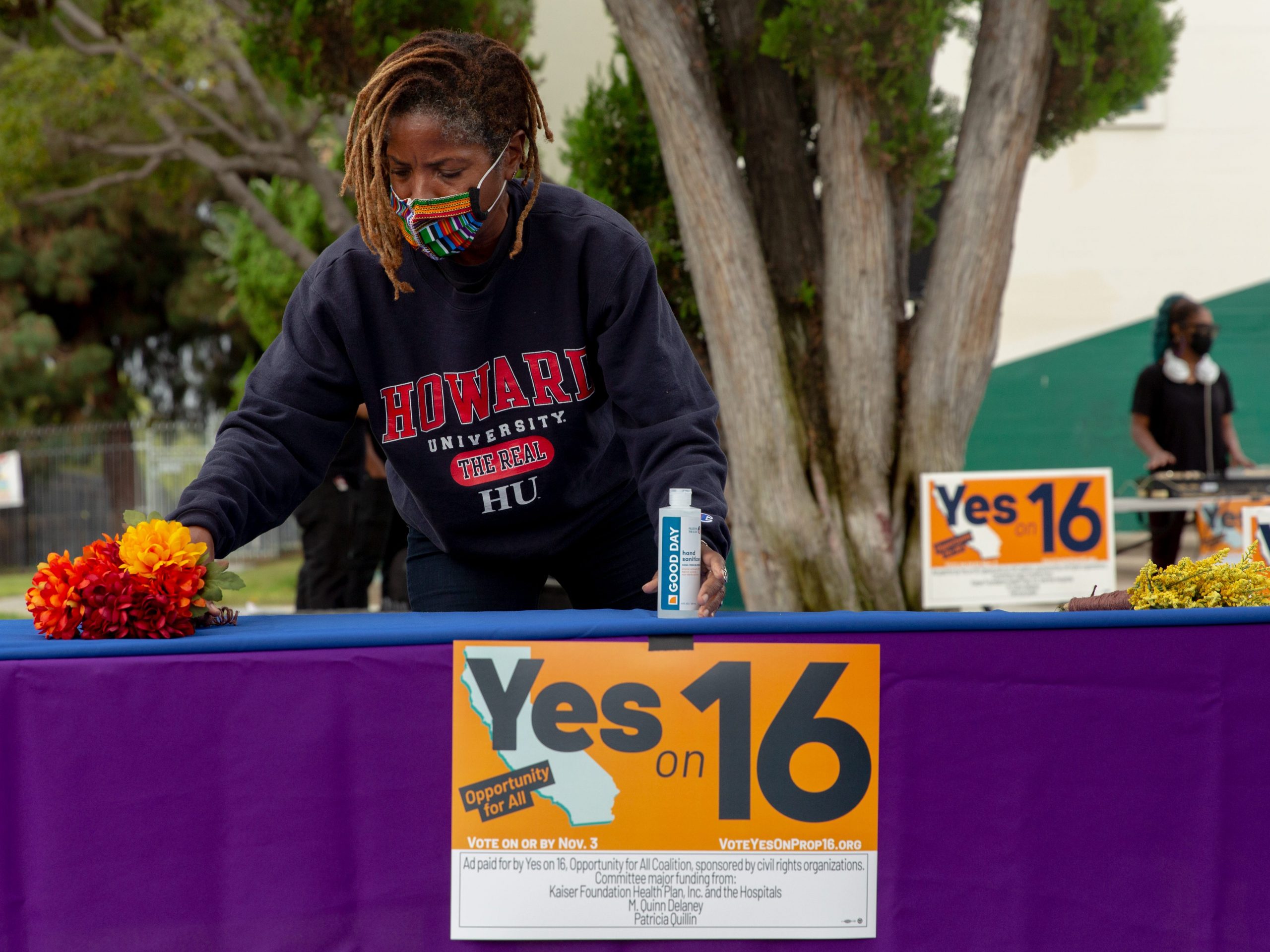 Proposition 16 supporters rally during early voting in California