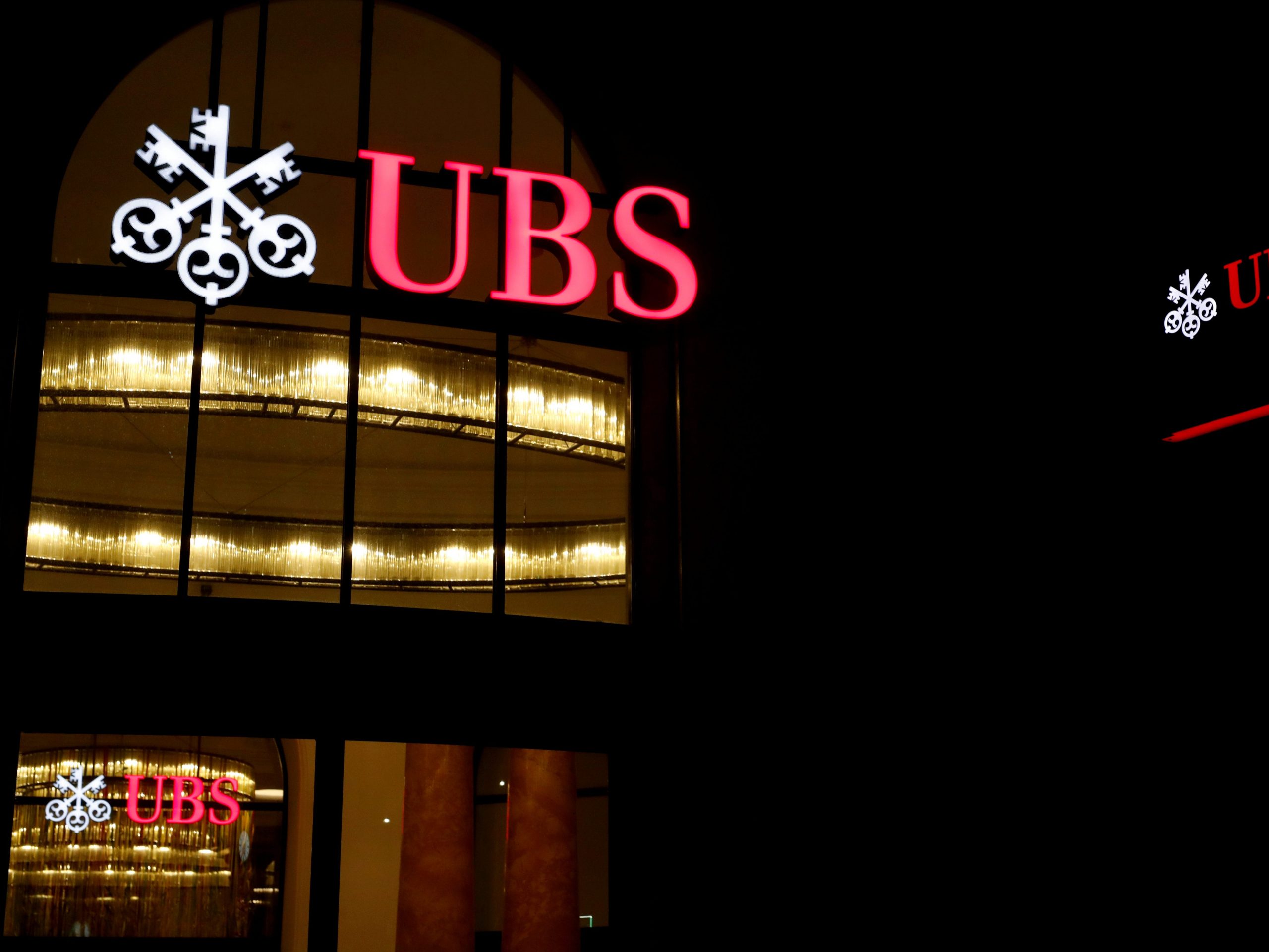 FILE PHOTO: The logo of Swiss bank UBS is seen at a branch office in Basel, Switzerland March 2, 2020. REUTERS/Arnd Wiegmann