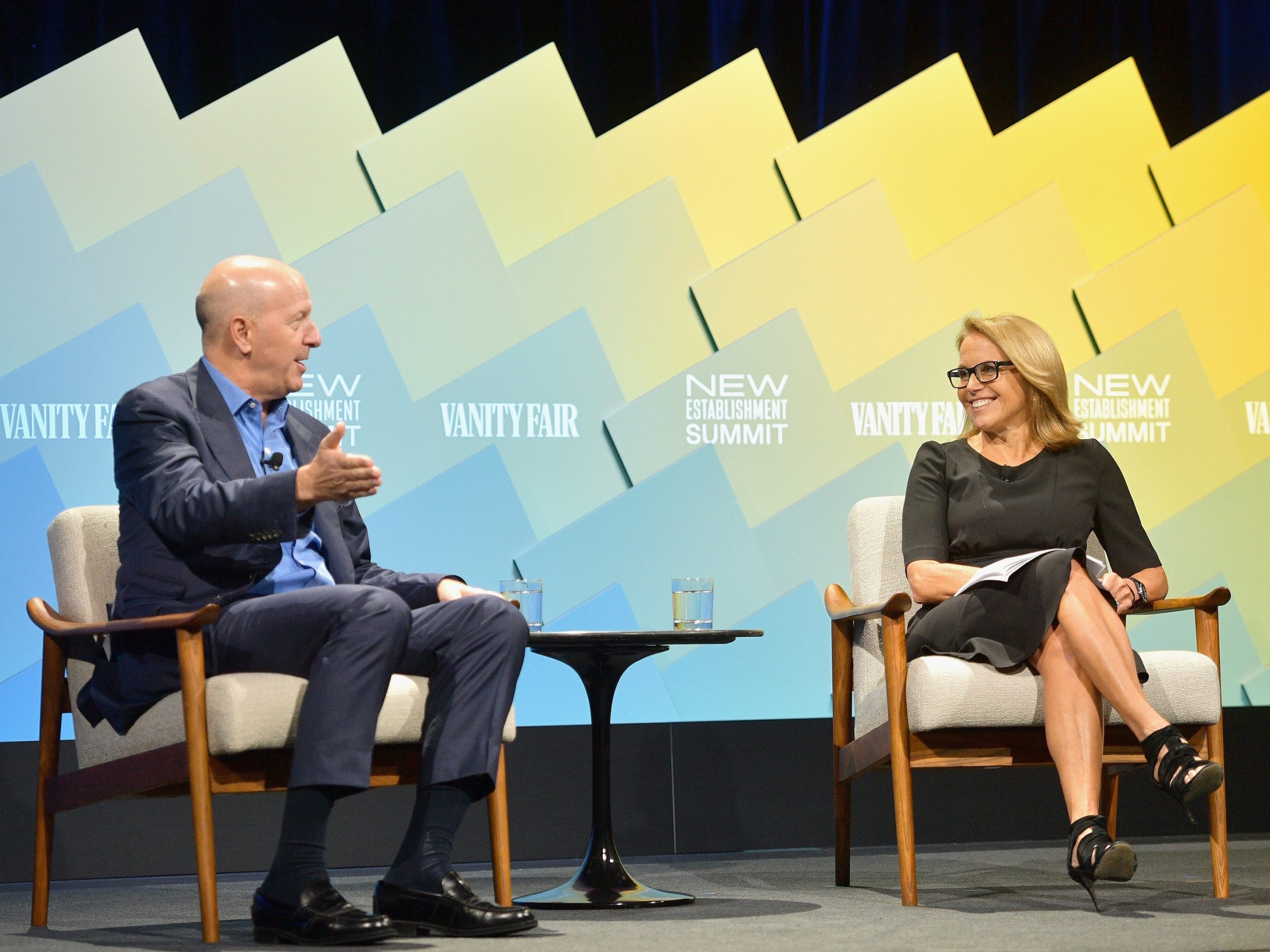 Goldman Sachs CEO David Solomon and journalist Katie Couric speak onstage at a Vanity Fair event in 2018.