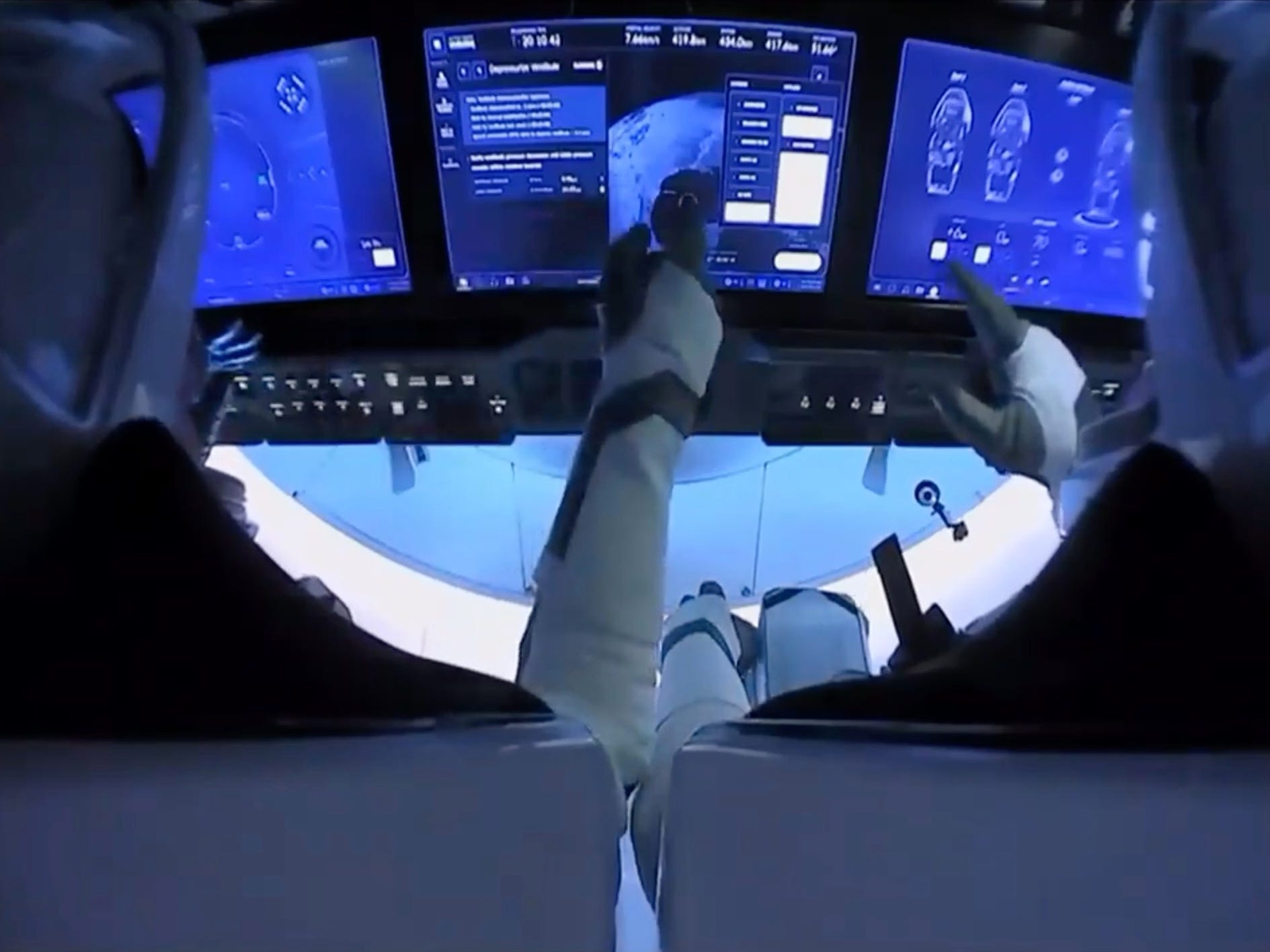 spacex crew dragon endeavour astronauts touch screen nasa astronauts bob behnken doug hurley