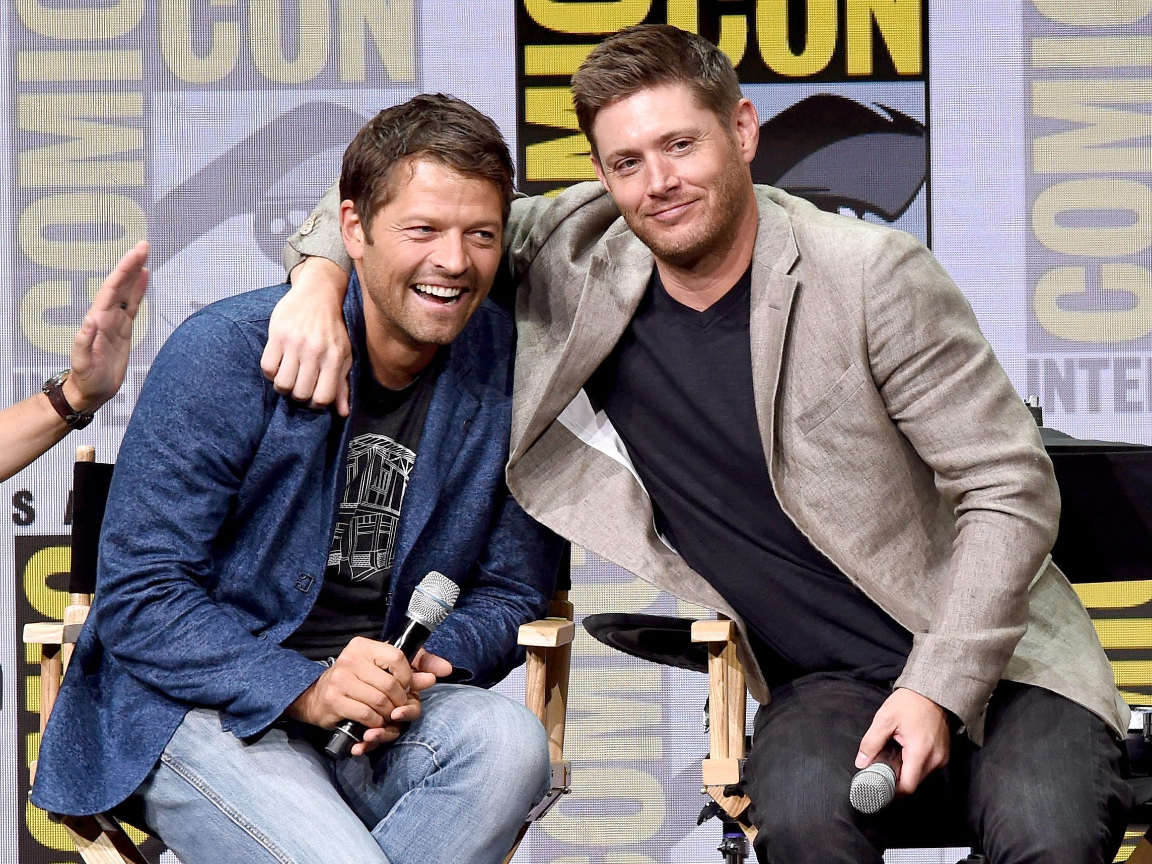 Actors Misha Collins (L) and Jensen Ackles at the "Supernatural" panel during Comic-Con International 2017 at San Diego Convention Center on July 23, 2017 in San Diego, California.