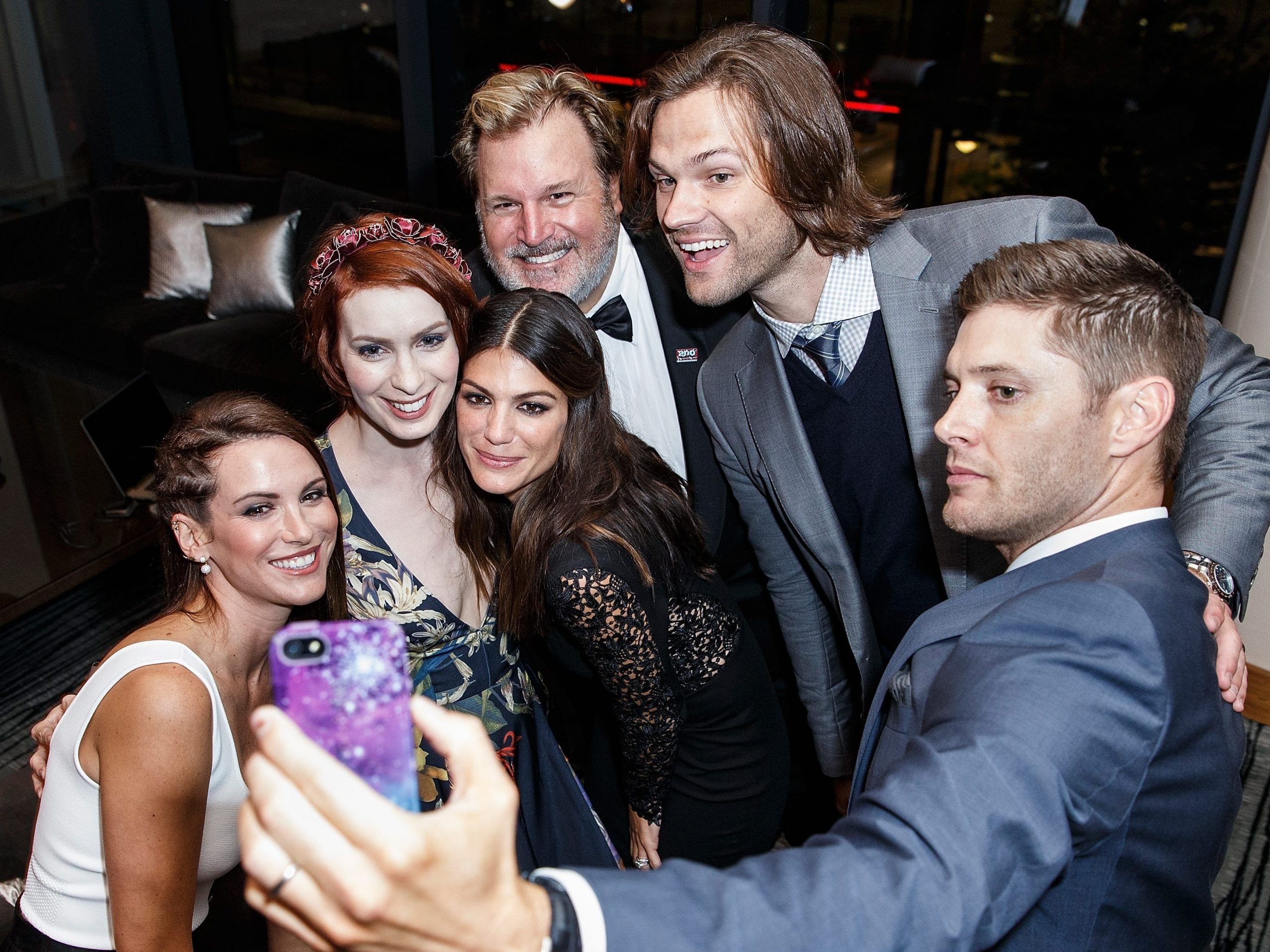 Actress Danneel Ackles, Actress Felicia Day, Actress Genevieve Padalecki, Producer Jim Michaels, Actor Jared Padalecki and Actor Jensen Ackles take a selfie at the 200th episode of 'Supernatural' party at Fairmont Pacific Rim Hotel on October 18, 2014 in Vancouver, Canada.