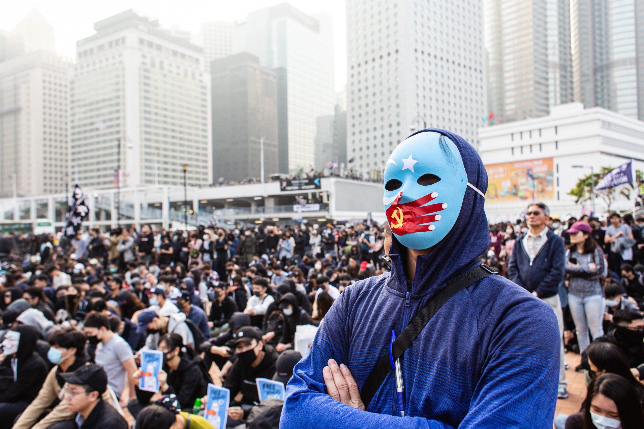 A masked protester looks on during the demonstration. 6th month of civil unrest, protesters attend a rally in solidarity with Uyghurs in Xinjiang. Speeches were given by event organisers. Riot Policemen appeared and were confronted by masked demonstrators.