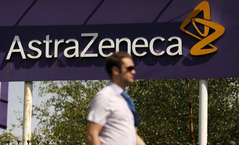 FILE PHOTO: A man walks past a sign at an AstraZeneca site in Macclesfield, central England May 19, 2014. REUTERS/Phil Noble