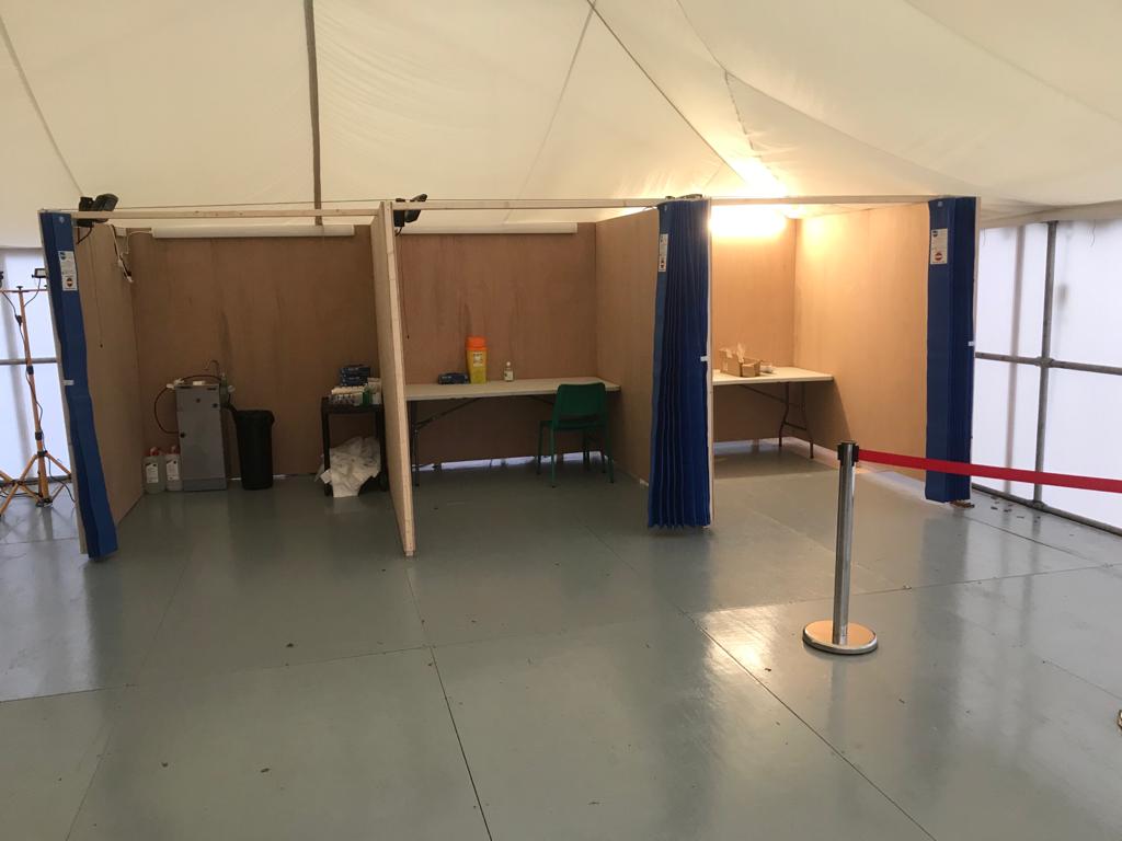 There's a one-way system and cubicles inside the marquee.